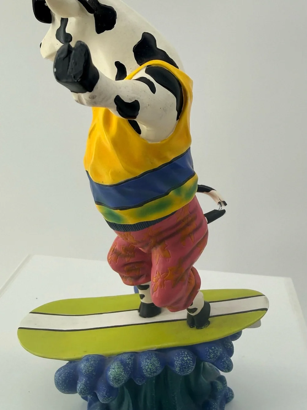 Playful Yellow Cow Figurine with Sunglasses Decorative Accent
